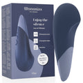 Vibromasseur clitoridien Womanizer Vibe bleu nuit, surface large et bords incurvés